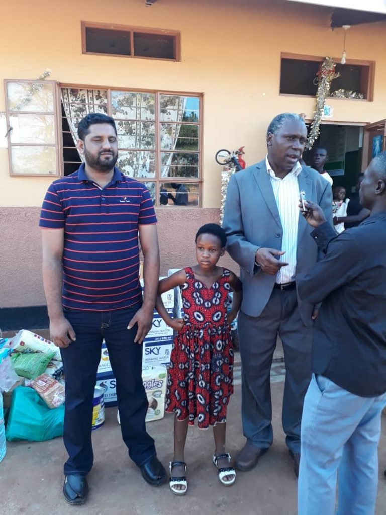 Ambassador Julius Peter Moto delivers Assortment of Items and Cash Donation to Lira Babies Home